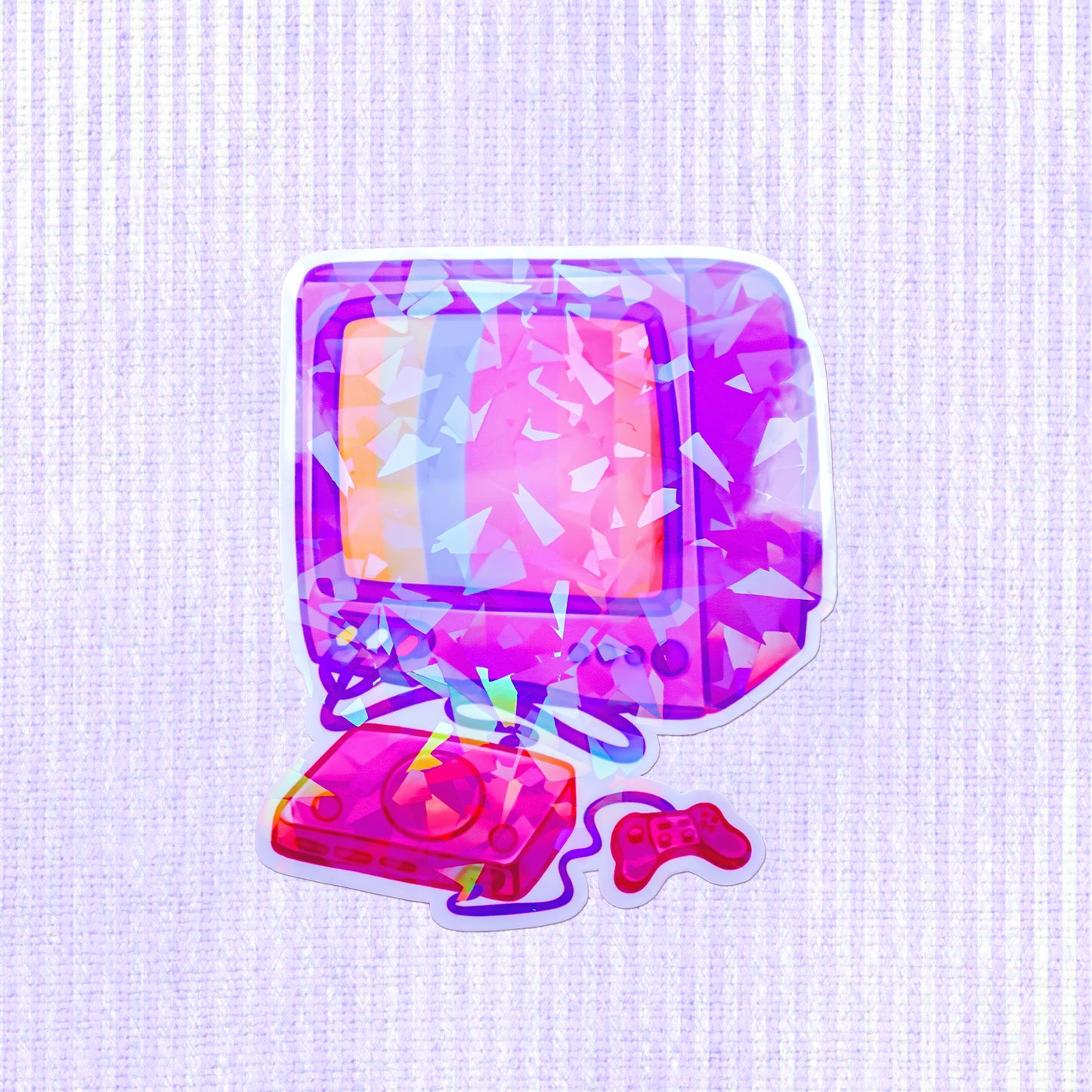 Colorful holographic vinyl sticker of a 90s TV and gaming console, perfect for adding a retro touch to personal items and rekindling nostalgic vibes.