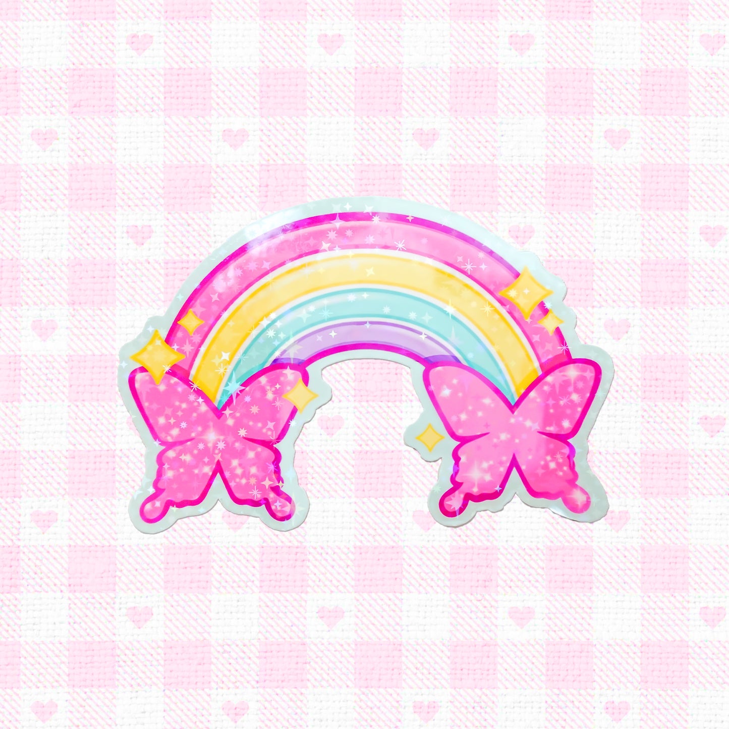 Vibrant holographic sticker featuring a rainbow with star details and pink butterflies, ideal for infusing a touch of magic and color into any setting.