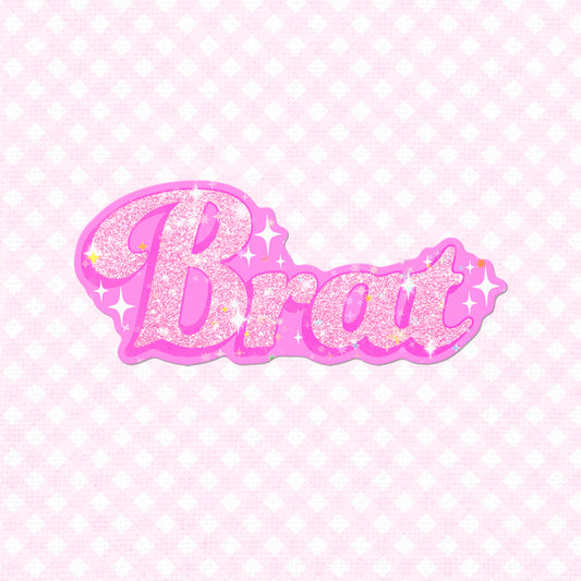 A glittery pink "Brat" text design with sparkles, available as a vinyl sticker.