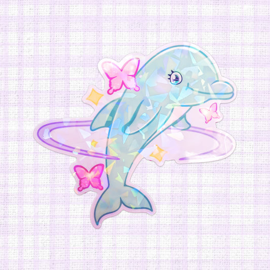 Holographic vinyl sticker of a dolphin surrounded by colorful butterflies, perfect for adding a touch of whimsy to any surface.