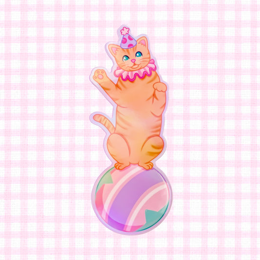 Holographic vinyl sticker featuring a kawaii cat balancing on a circus ball, waterproof and perfect for laptops, water bottles, and journals