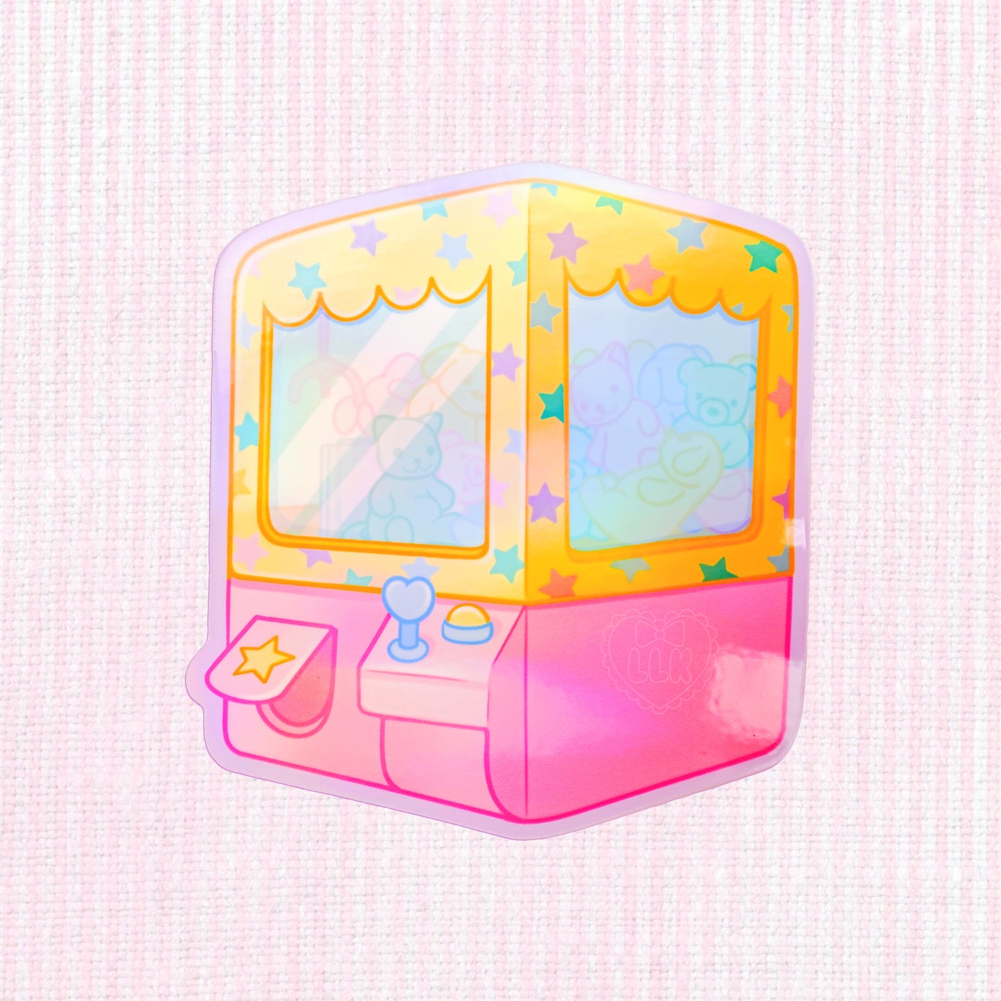 Holographic vinyl sticker featuring a kawaii claw machine, perfect for decorating laptops, water bottles, and journals.