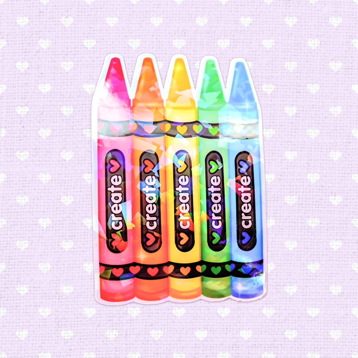 Colorful holographic vinyl sticker of crayons with the word 'Create', perfect for adding a vibrant touch to creative spaces.