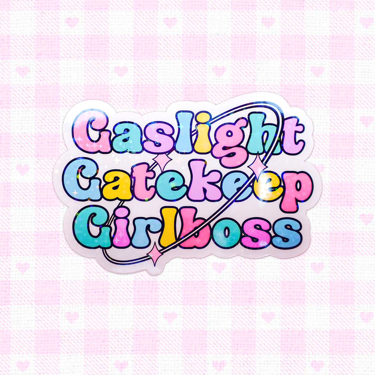 'Gaslight Gatekeep Girlboss' written in colorful, holographic style on a vinyl sticker.