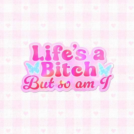 Holographic sticker reading "Life’s a Bitch But So Am I."