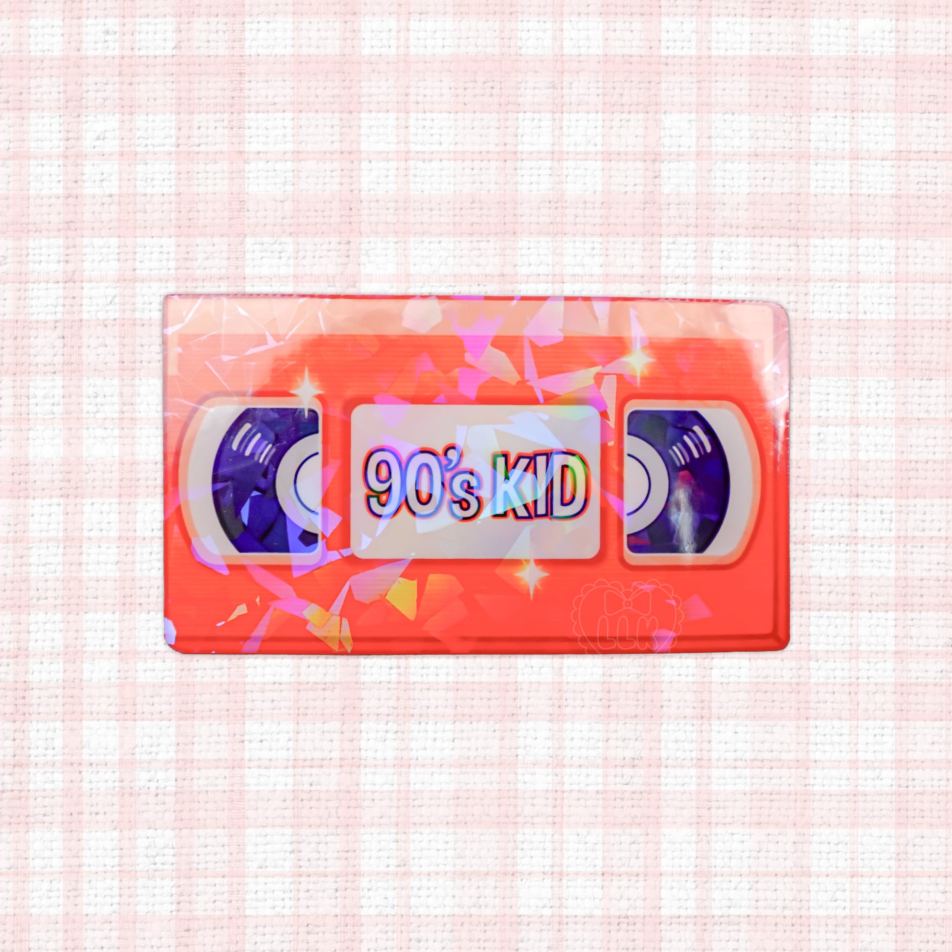 Holographic orange VHS tape sticker