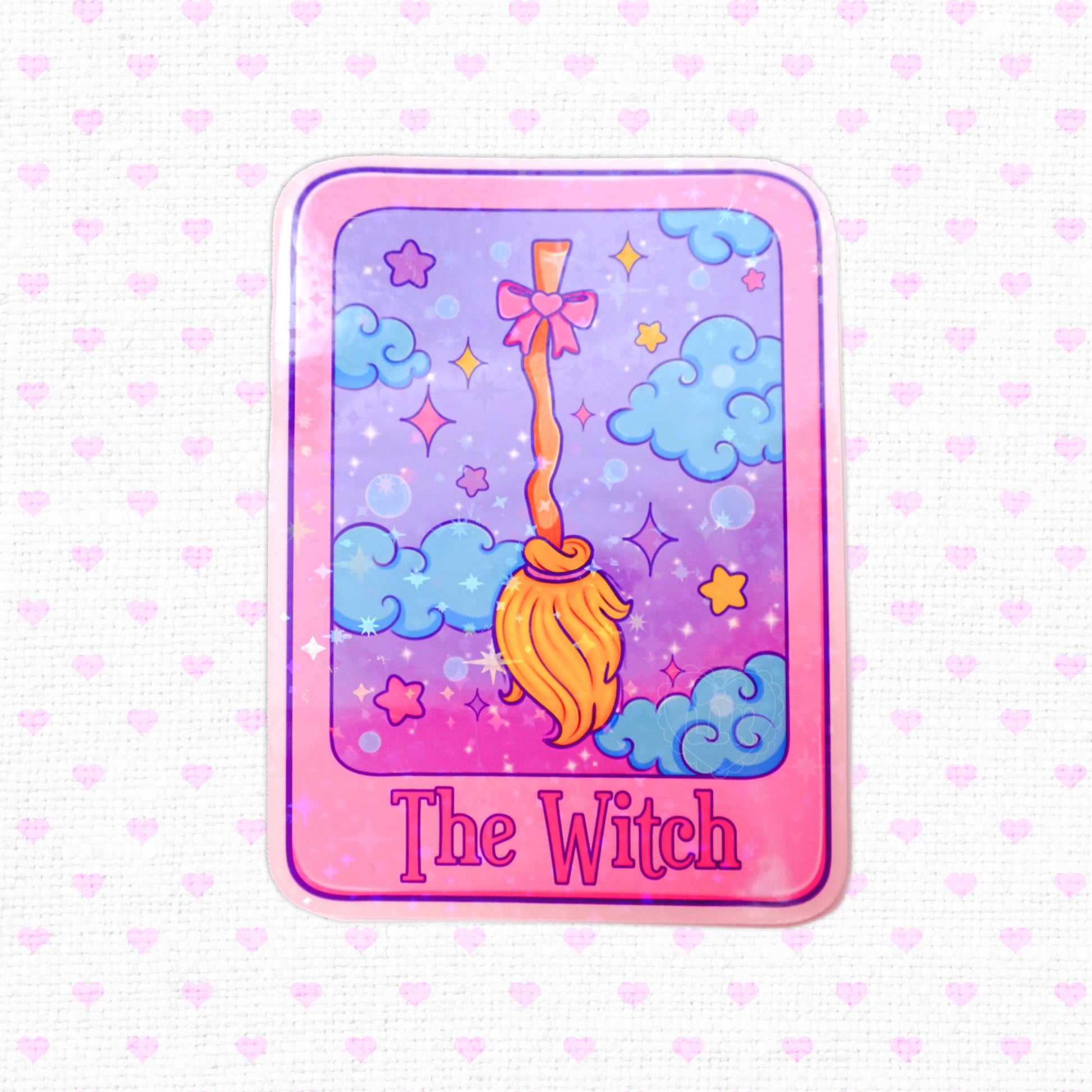 Holographic tarot card sticker labeled 'The Witch' with magical cloud and star motifs.