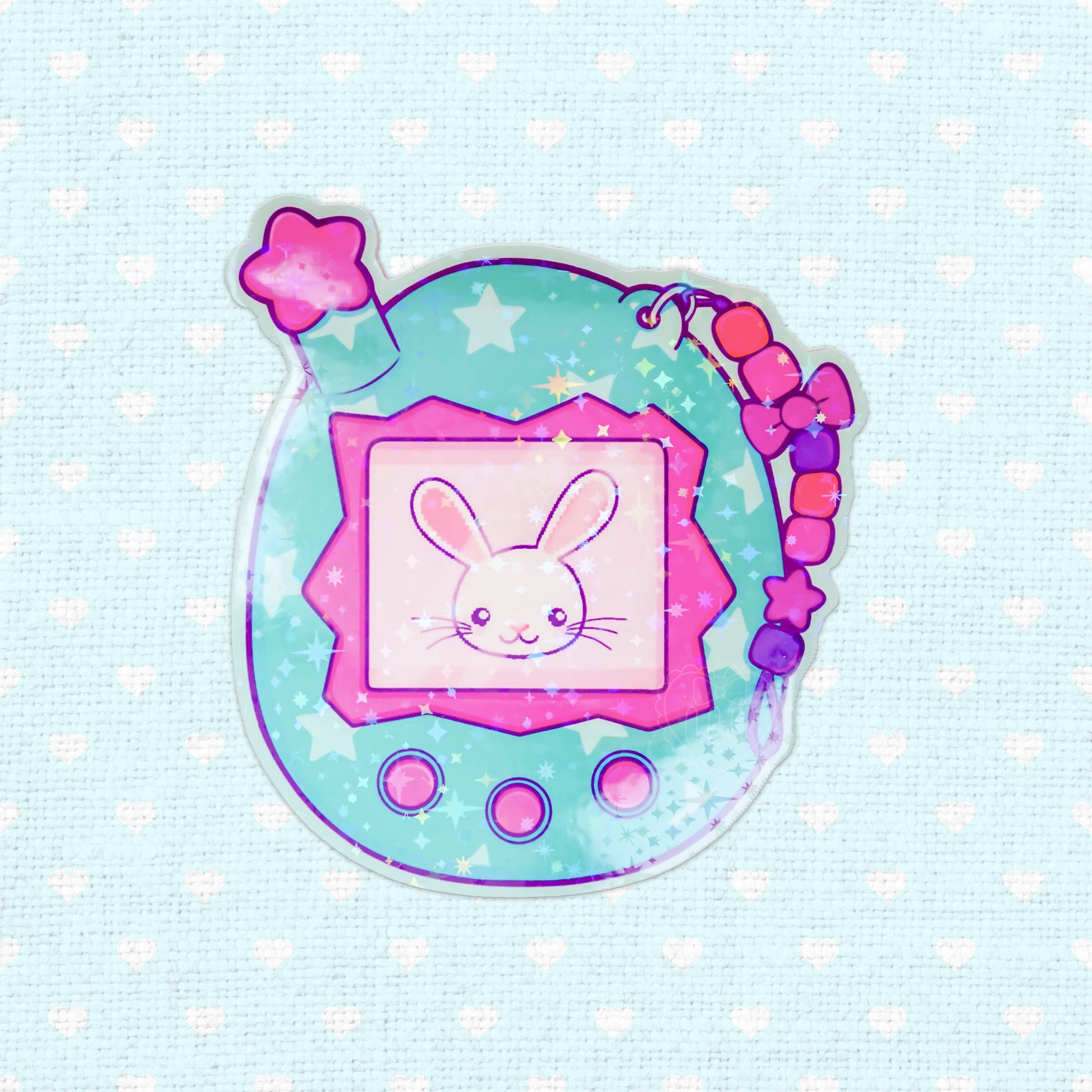 Holographic vinyl sticker of a classic Tamagotchi device.