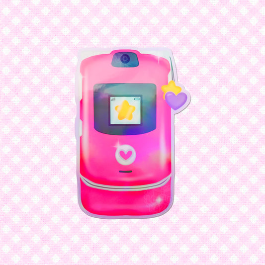 A holographic Y2K flip phone vinyl sticker in a cute kawaii style, inspired by nostalgic early 2000s aesthetics. Perfect for journaling, laptops, or decorating.